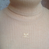 Pull col roulé Courreges vintage