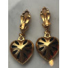 Paire de clips Yves Saint-Laurent vintage coeur